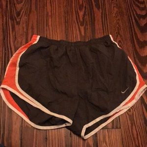 Nike track shorts gray white trim orange mesh